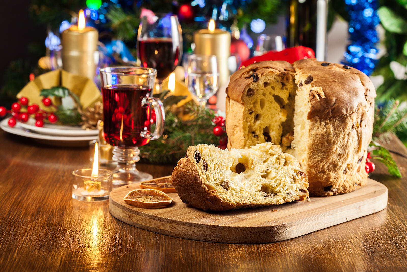 Christmas panettone cake with raisins, fruit and wine