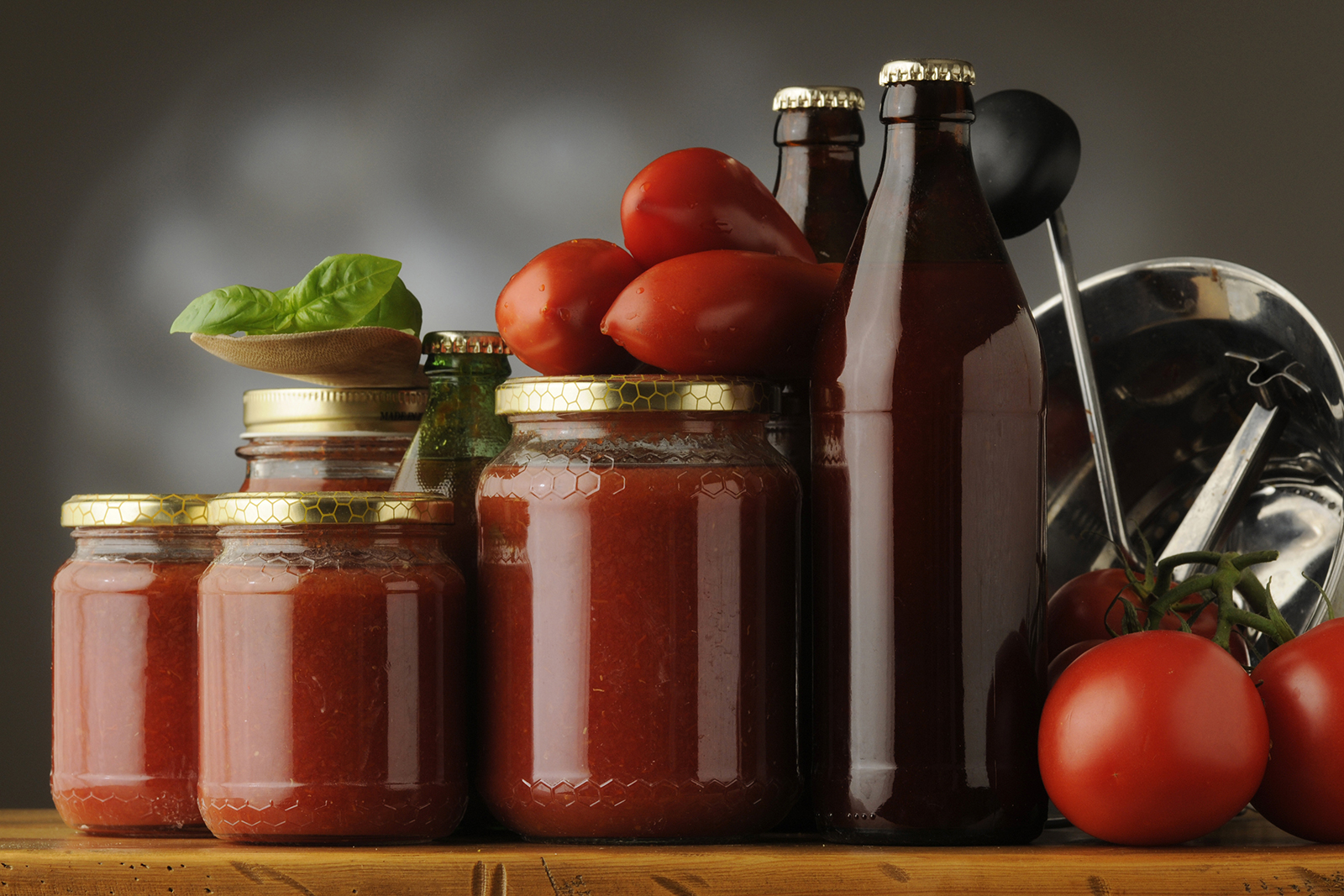 jars of pasta sauce with no label sitting on table