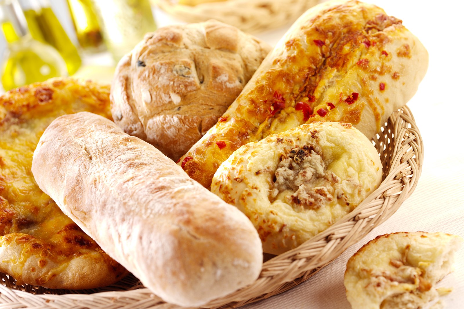 Fresh Assorted Italian Breads in basket with great lighting