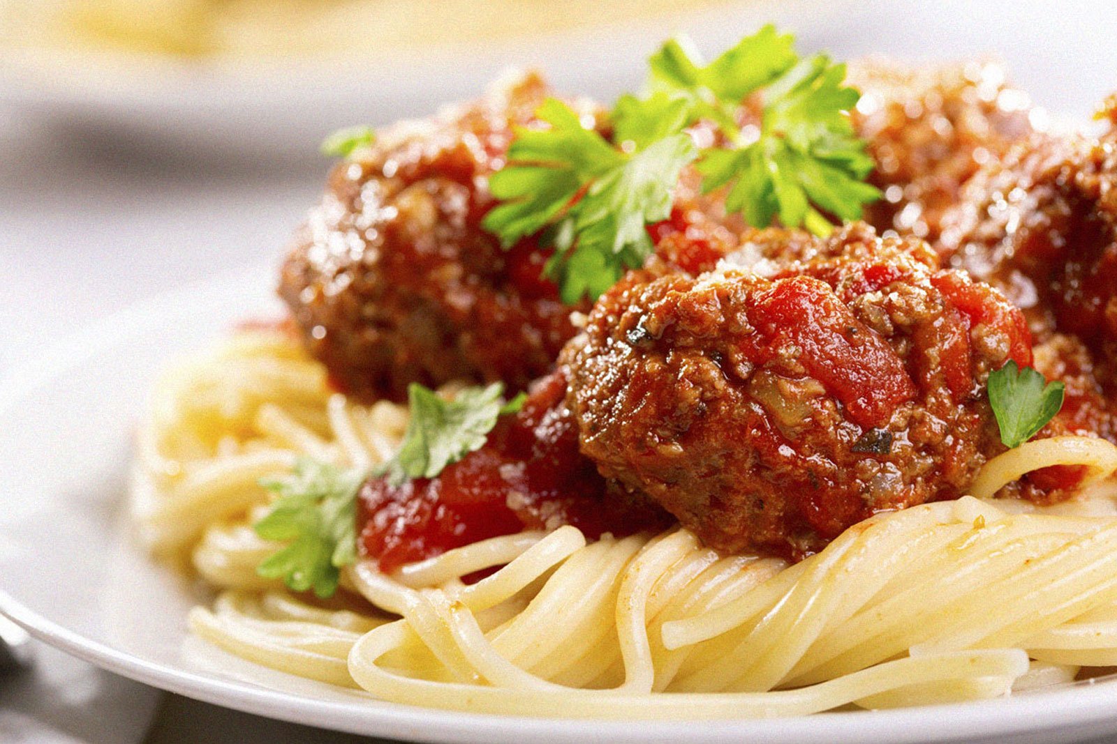up close shot of spaghetti with  meatballs